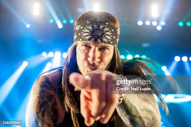 Stix Zadinia of Steel Panther performs on stage at Hammersmith Apollo on November 15, 2012 in London, United Kingdom.