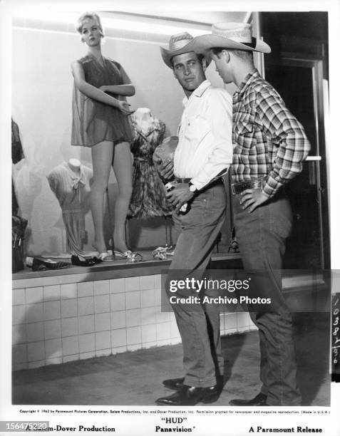 Brandon De Wilde window shopping with a friend in a scene from the film 'Hud', 1962.