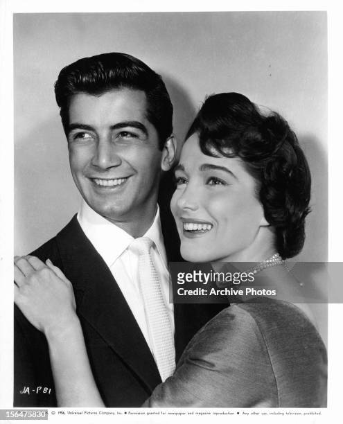 Ray Danton and Julie Adams publicity portrait for the film 'The Looters', 1955.