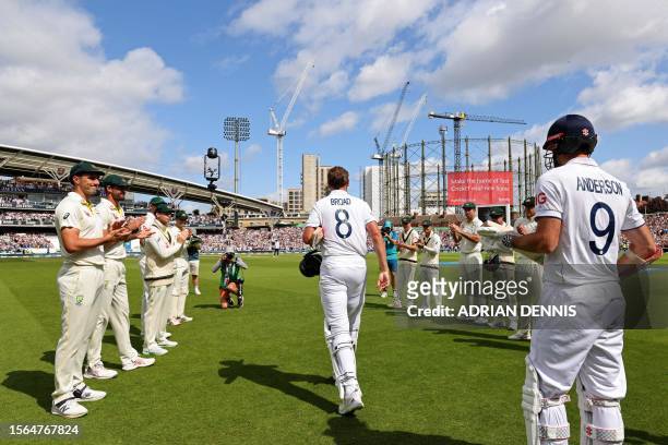 England's Stuart Broad is given a guard of honour by the Australia players as he comes out to bat ahead of play on day four of the fifth Ashes...