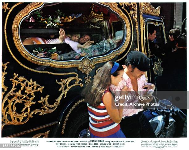 Judy Geeson and Vince Edwards trapped inside a coffin in a scene from the film 'Hammerhead', 1968.