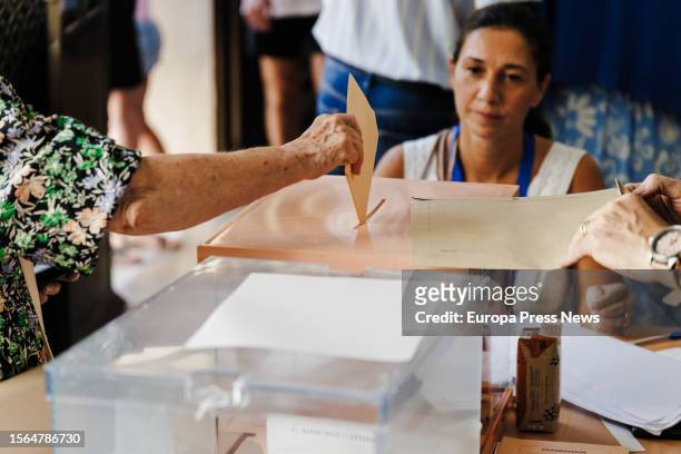 Person exercises his right to vote during the general elections, at the Colegio de Nuestra Señora del Buen Consejo, July 23 in Madrid, Spain....