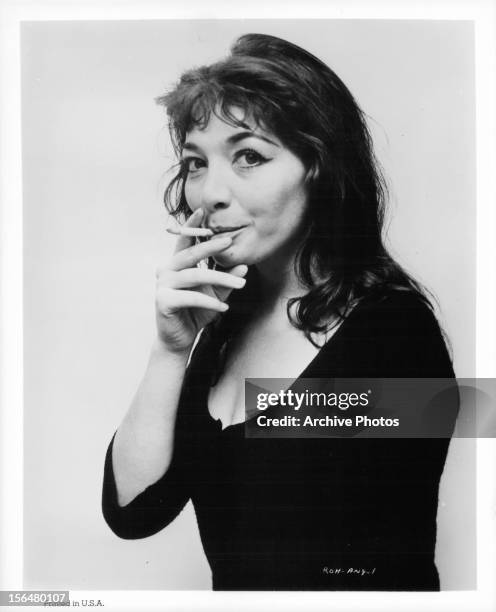 Juliette Gréco with cigarette in publicity portrait for the film 'The Roots Of Heaven', 1958.