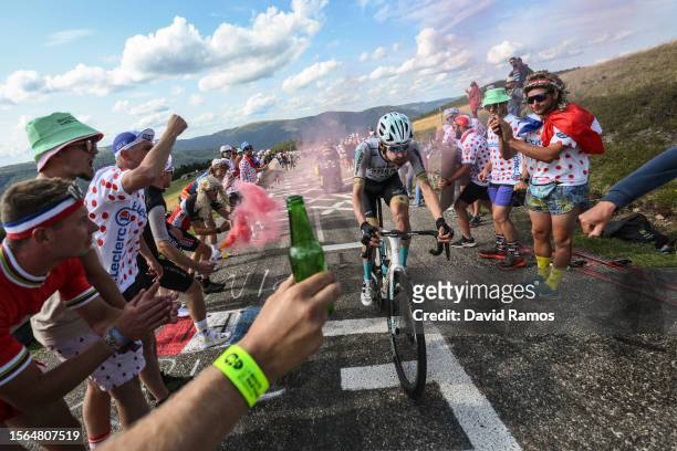 Wout Poels of The Netherlands and Team Bahrain Victorious competes climbing to the Le Markstein while fans cheers during the stage twenty of the...