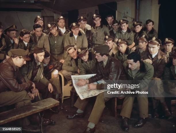 American military officer Lieutenant Colonel James Averell Clark briefing United States Army Air Forces North American P-51 Mustang pilots of 334th...