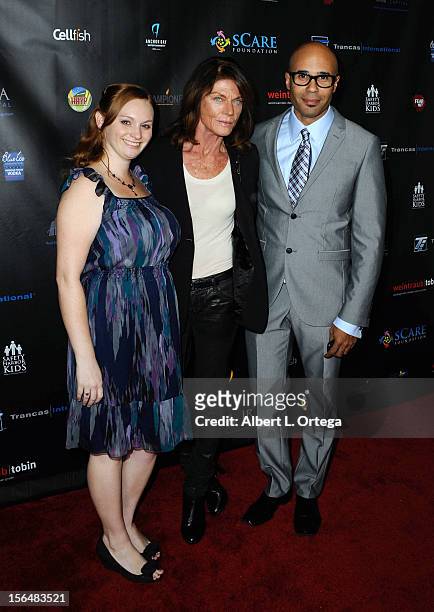 Actress Meg Foster and agent Chris Roe arrive for sCare Foundation's 2nd Annual Halloween Benefit held at The Conga Room at L.A. Live on October 28,...