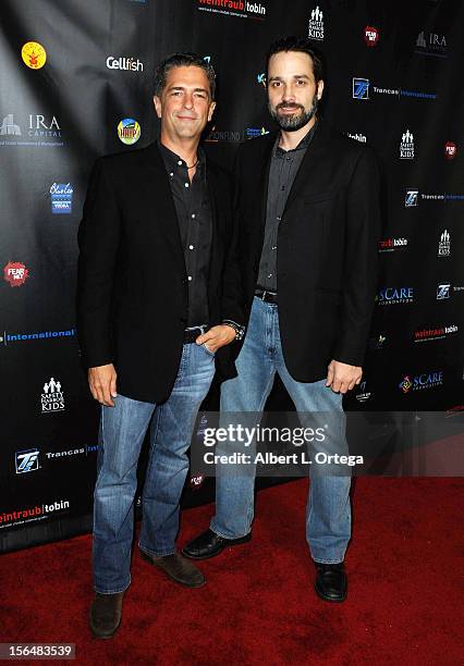 Producers Malek Akkad and Justin Beam arrive for sCare Foundation's 2nd Annual Halloween Benefit held at The Conga Room at L.A. Live on October 28,...