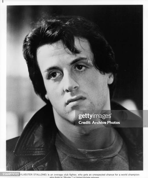 Sylvester Stallone looks unamused in a scene from the film 'Rocky', 1976.