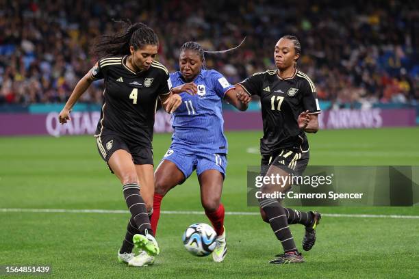 Kadidiatou Diani of France competes for the ball against Chantelle Swaby and Allyson Swaby of Jamaica during the FIFA Women's World Cup Australia &...