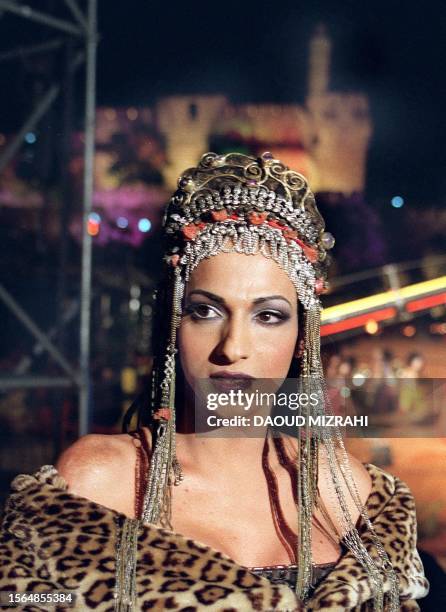 Israeli transsexual Dana International, the winner of last year's Eurovision song contest, takes part in a video clip, 11 May 1999 in Jerusalem's Old...