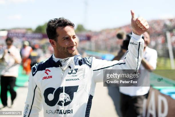 Daniel Ricciardo of Australia and Scuderia AlphaTauri prepares to drive on the grid prior to the F1 Grand Prix of Hungary at Hungaroring on July 23,...