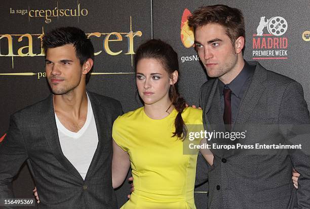 Kristen Stewart, Robert Pattinson and Taylor Lautner attend 'The Twilight Saga: Breaking Dawn - Part 2' photocall at Kinepolis Cinema on November 15,...