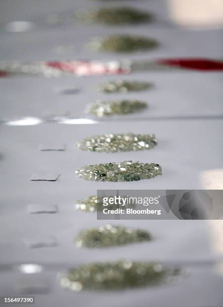 Piles of uncut diamonds are seen during the grading process in the sorting room at DTC Botswana, a unit of De Beers, in Gaborone, Botswana, on...