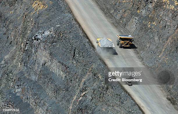 Mining truck carries diamond-bearing kimberlite rock to a processing facility after being cut from the base of the Jwaneng mine, operated by the...