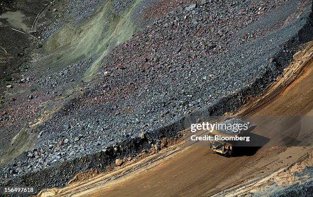 Mining truck carries diamond-bearing kimberlite rock away from the pit floor at the Jwaneng mine, operated by the Debswana Diamond Co., a joint...