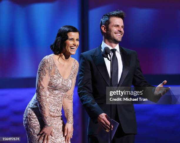 Nelly Furtado and Mark Tacher speak onstage at the XIII Annual Latin Grammy Awards held at Mandalay Bay Events Center on November 15, 2012 in Las...