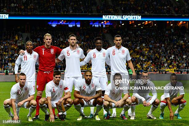 England's midfielder Ashley Young, goalkeeper Joe Hart, defender Gary Cahill, striker Danny Welbeck, defender Steven Caulker, midfielder Tom...