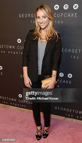 Cupcakes and Cashmere" blogger Emily Schuman attends the Los Angeles Grand Opening of Georgetown Cupcake Los Angeles on November 15, 2012 in Los...