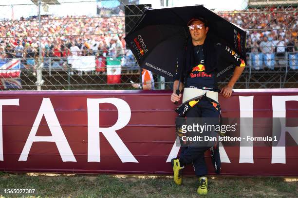 Sergio Perez of Mexico and Oracle Red Bull Racing looks on from the grid during the F1 Grand Prix of Hungary at Hungaroring on July 23, 2023 in...