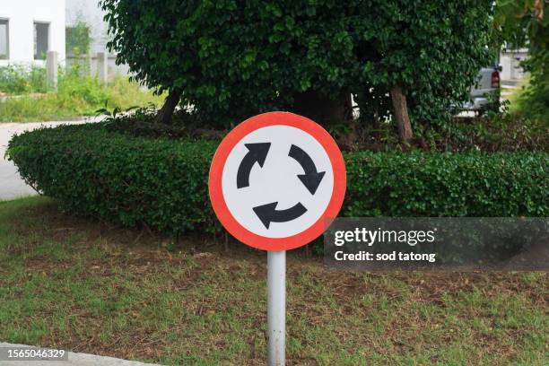 Roundabout With Signs Roundabout Sign Photos and Premium High Res Pictures - Getty Images