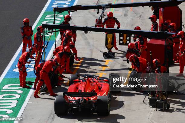 Charles Leclerc of Monaco driving the Ferrari SF-23 makes a pitstop during the F1 Grand Prix of Hungary at Hungaroring on July 23, 2023 in Budapest,...