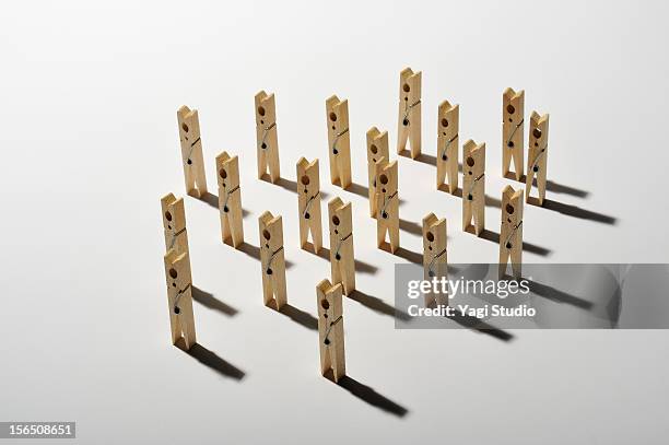 a lot of clothespins standing - mola de roupa imagens e fotografias de stock