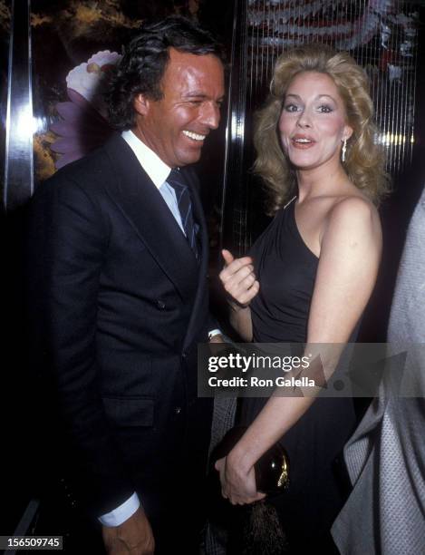 Singer Julio Iglesias and singer Leonore O'Malley attend Regine Zylberberg's Pre-Valentine's Day Party on February 13, 1982 at Regine's in New York...