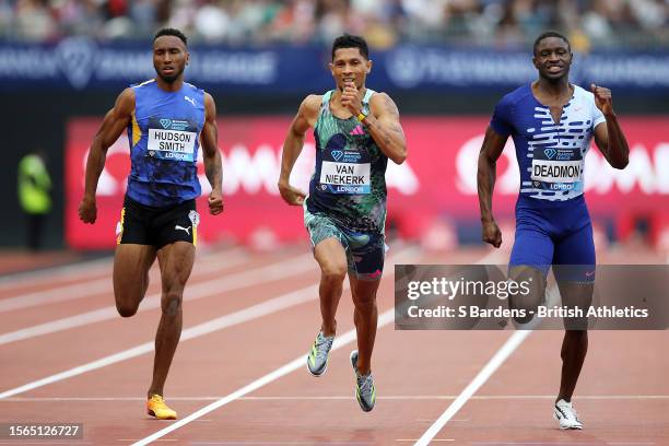 Matthew Hudson Smith of Team Great Britain, Wayde Van Niekerk of Team South Africa and Bryce Deadmon of Team United States compete in Men's 400...