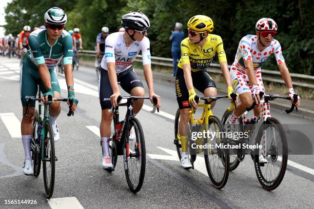 Jasper Philipsen of Belgium and Team Alpecin-Deceuninck - Green Points Jersey, Tadej Pogacar of Slovenia and UAE Team Emirates - White Best Young...