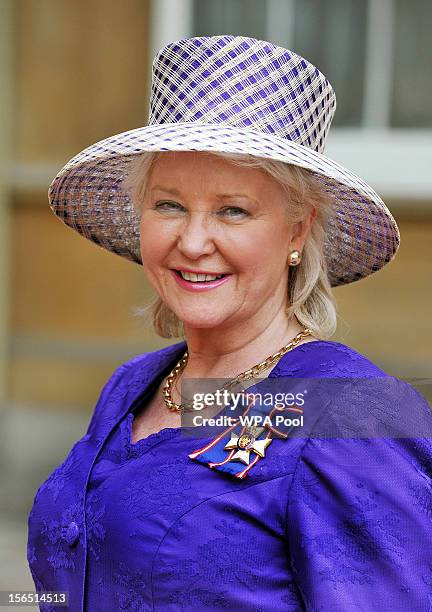 Angela Kelly the personnel dresser to Her Majesty proudly wears her Royal Victorian Order medal, after it was presented to her by Queen Elizabeth II,...