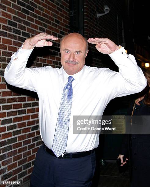 Dr. Phil arrives for "The Late Show with David Letterman" at Ed Sullivan Theater on November 15, 2012 in New York City.