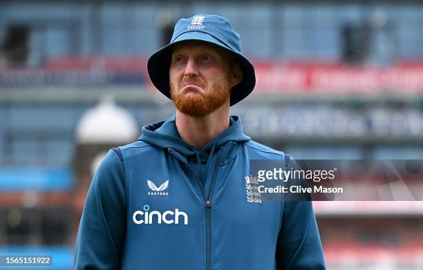 Ben Stokes of England walks off the pitch as the rain starts to fall again on day five of the LV=Insurance Ashes 4th Test Match between England and...