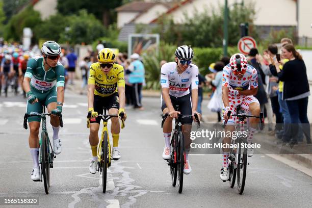 Jasper Philipsen of Belgium and Team Alpecin-Deceuninck - Green Points Jersey, Tadej Pogacar of Slovenia and UAE Team Emirates - White Best Young...