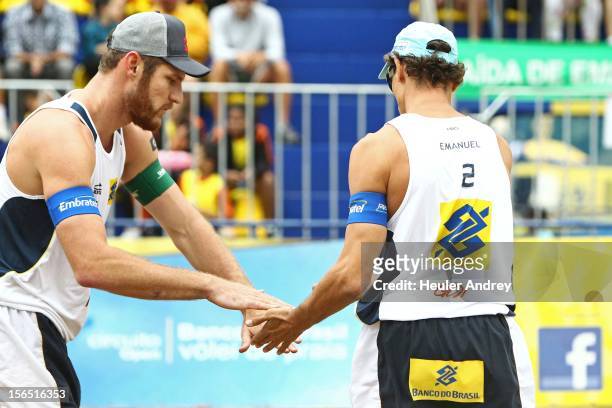 Allison and Emanuel celebrate during a match for the 5th stage of the season 2012/2013 of Banco do Brasil Beach Volleyball Circuit on November 16,...