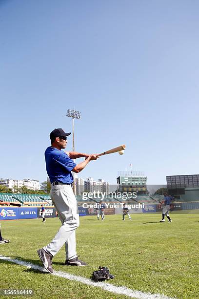 Johnny Damon of Team Thailand hits ground balls during a drill during the workout day for the 2013 World Baseball Classic Qualifier at Xinzhuang...