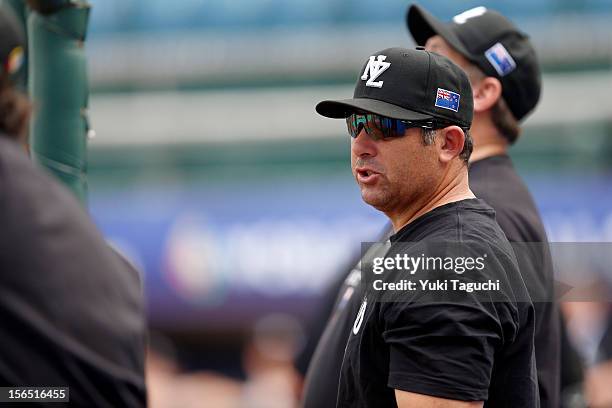 Andy Skeels manager of Team New Zealand looks on during batting practice during the workout day for the 2013 World Baseball Classic Qualifier at...