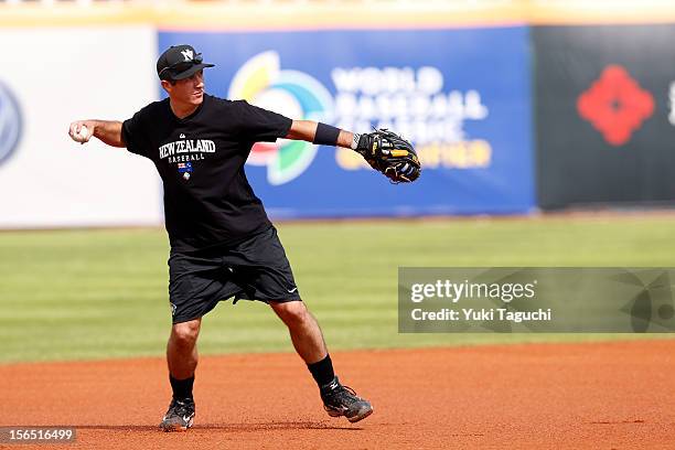 David Skeels of Team New Zealand throws to first base during the workout day for the 2013 World Baseball Classic Qualifier at Xinzhuang Stadium on...