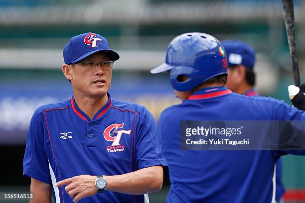 Jung-Hua Liu third base coach of Team Chinese Taipei talks to players during the workout day for the 2013 World Baseball Classic Qualifier at...