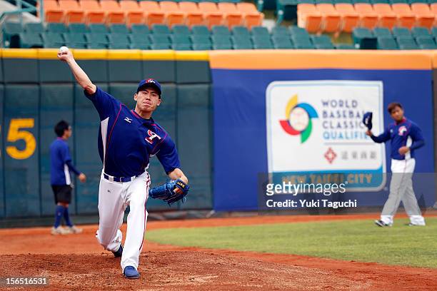 Yu-Ching Lin of Team Chinese Taipei throws in the bullpen during the workout day for the 2013 World Baseball Classic Qualifier at Xinzhuang Stadium...