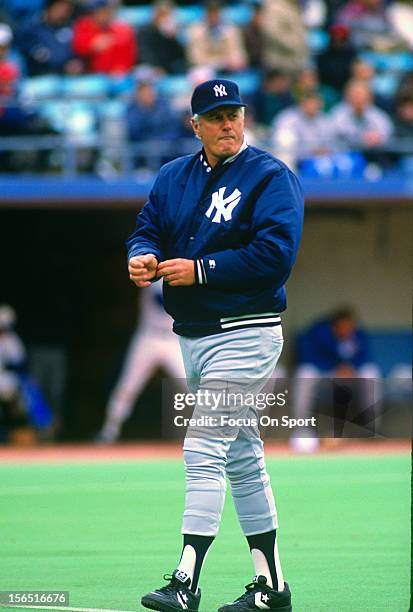 Manager Dallas Green of the New York Yankees signals the bullpen to make a pitching change during an Major League Baseball game circa 1989. Green...