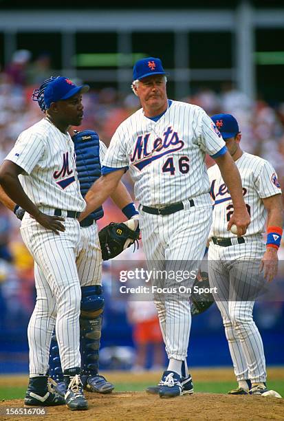 Manager Dallas Green of the New York Mets takes the ball from his pitcher to make a pitching change during a Major League Baseball game against the...