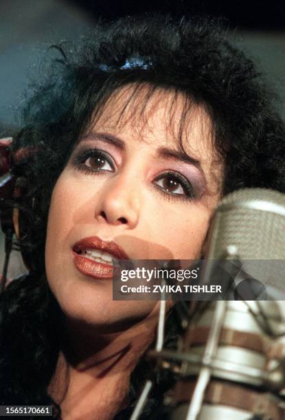 File photo dated July 1998 shows Israeli singer Ofra Haza during a recording session. The 41-year-old singer remained unconscious and in a critical...