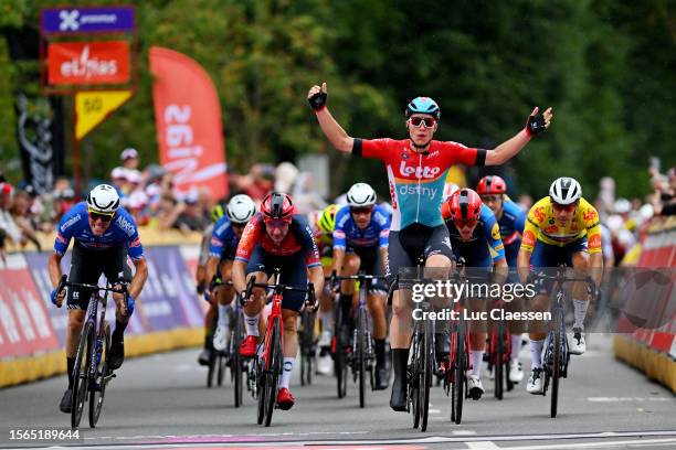 Arnaud de Lie of Belgium and Team Lotto-Dstny celebrates at finish line as stage winner ahead of Stefano Oldani of Italy and Team Alpecin-Deceuninck,...