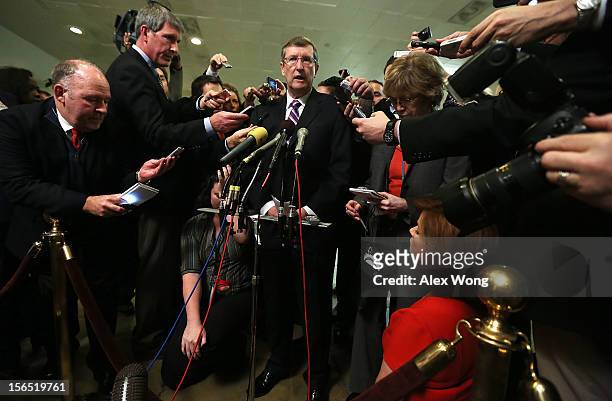 Sen. Kent Conrad speaks to members of the media after a hearing on the Benghazi attack before the Select Committee on Intelligence November 16, 2012...
