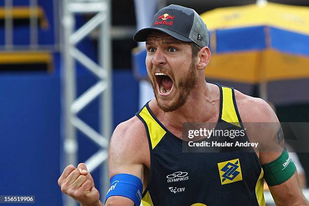 Allison celebrates during a match for the 5th stage of the season 2012/2013 of Banco do Brasil Beach Volleyball Circuit on November 16, 2012 in...