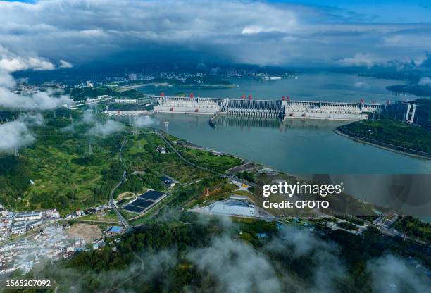 Photo shows the Three Gorges Dam shrouded by clouds in Yichang city, Hubei province, China, July 30, 2023.