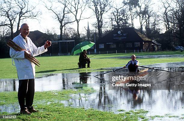 Weybridge Rowing Club oarsmen, Nigel Gower, takes time out from his training to test the new ''lake'' in town. Next month he attempts to break the...