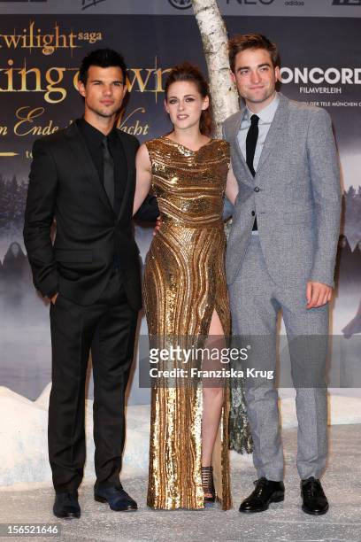 Taylor Lautner, Kristen Stewart and Robert Pattinson attend the 'Twilight Saga: Breaking Dawn Part 2' Germany Premiere at CineStar on November 16,...