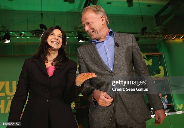 German Greens Party co-chancellor candidates Katrin Goering-Eckardt and Juergen Trittin arrive to speak at the Greens party federal convention on...