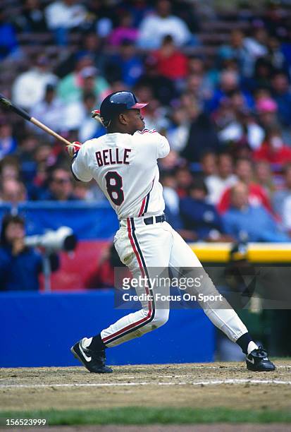 Albert Belle of the Cleveland Indians bats against the Oakland Athletics during an Major League Baseball game circa 1990 at Cleveland Stadium in...